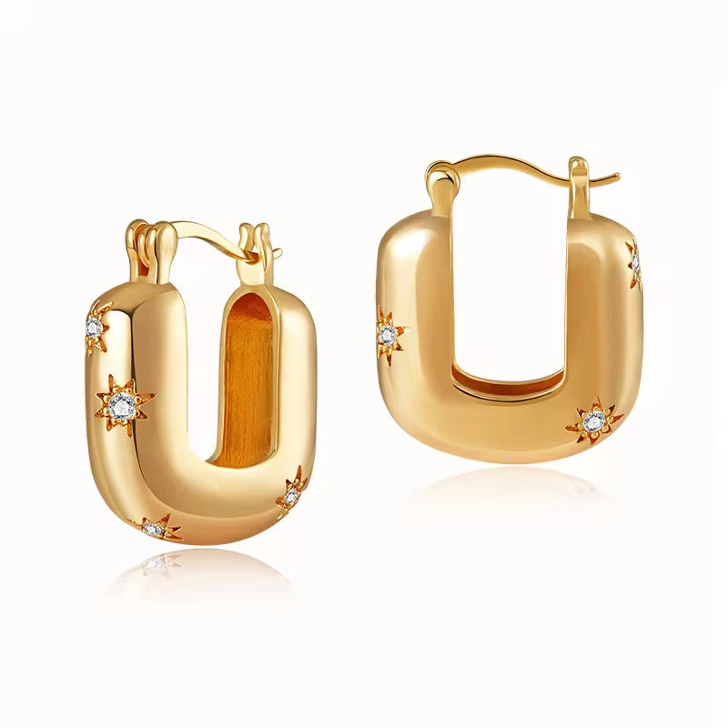 Solar Glow Hoops – Sculpted Gold Earrings with Starburst Crystals