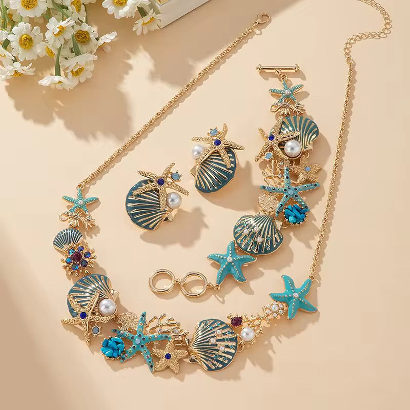 Oceanic Dream Studs – Starfish & Shell Gold Earrings
