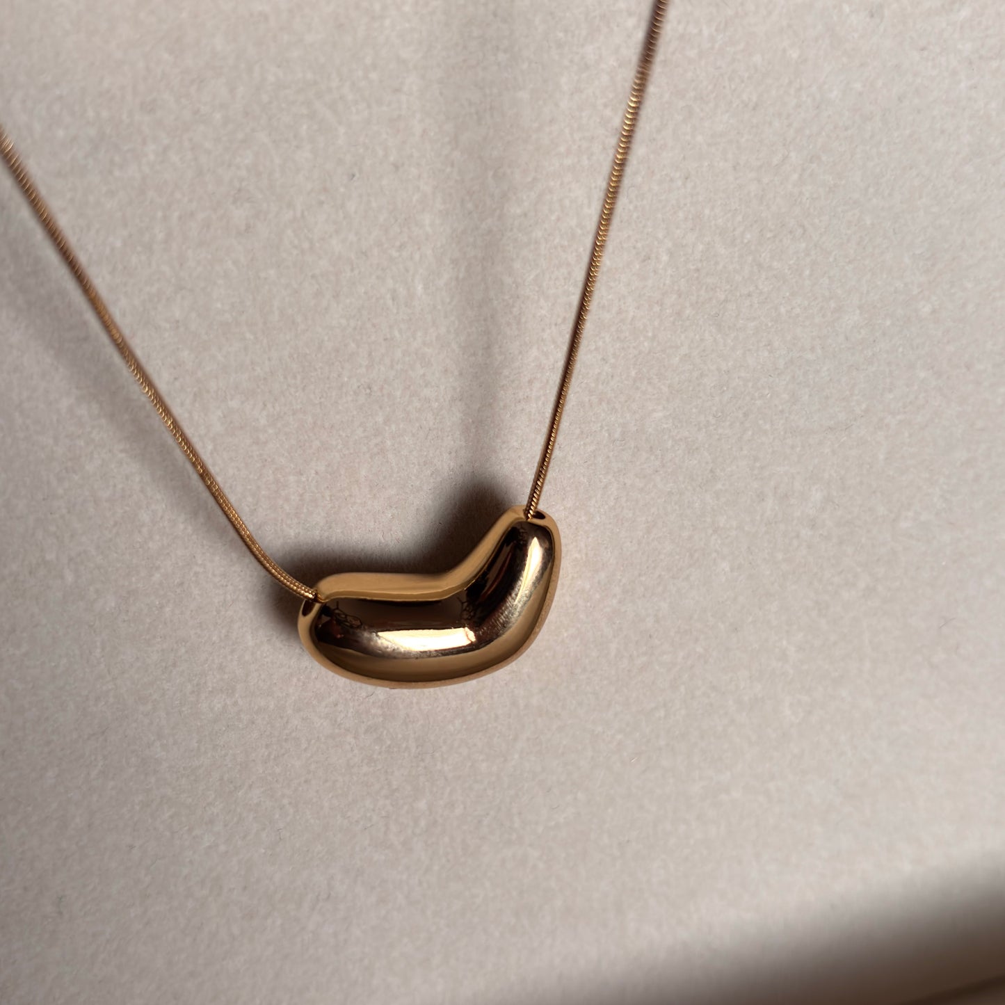 Molten Bean – Sculptural Gold Pendant Necklace