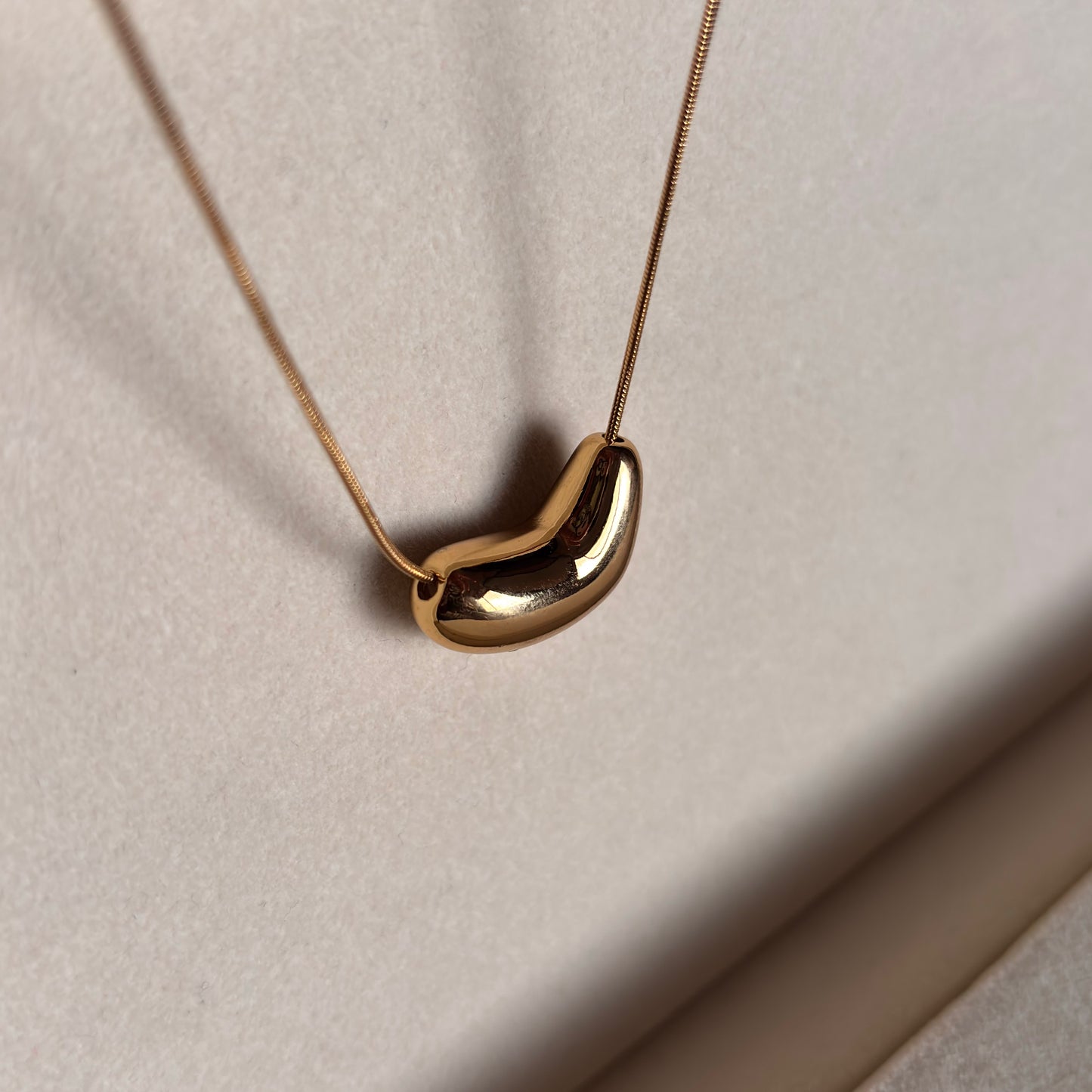 Molten Bean – Sculptural Gold Pendant Necklace