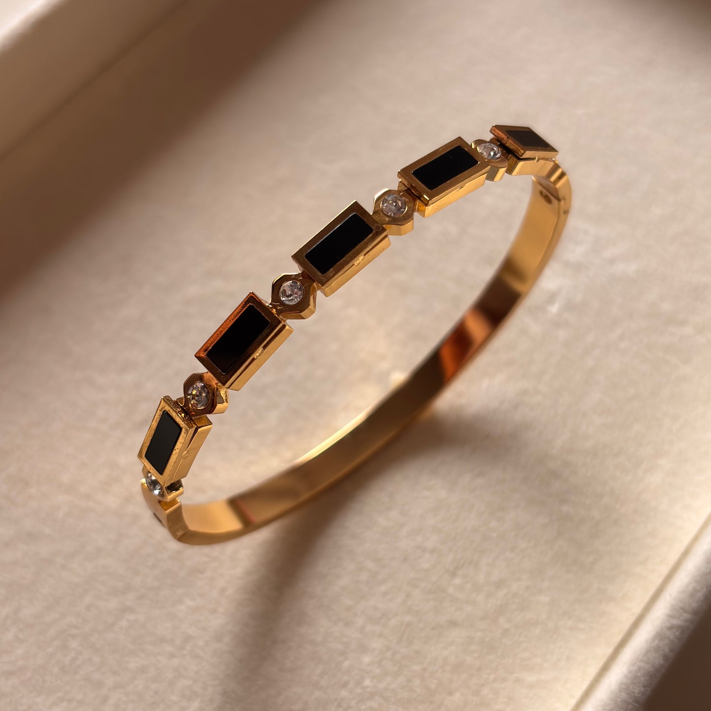 Trivah Aurora Gold Cuff – Sculpted Charm Bracelet
