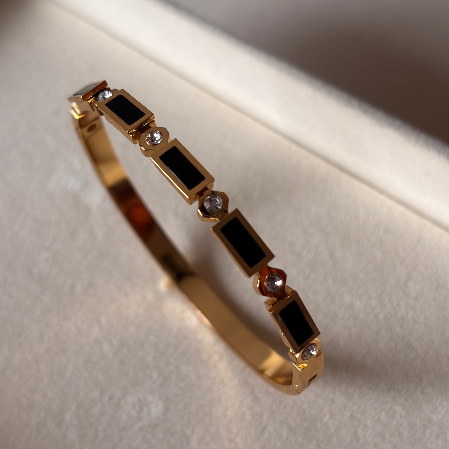 Trivah Aurora Gold Cuff – Sculpted Charm Bracelet
