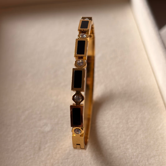 Trivah Aurora Gold Cuff – Sculpted Charm Bracelet