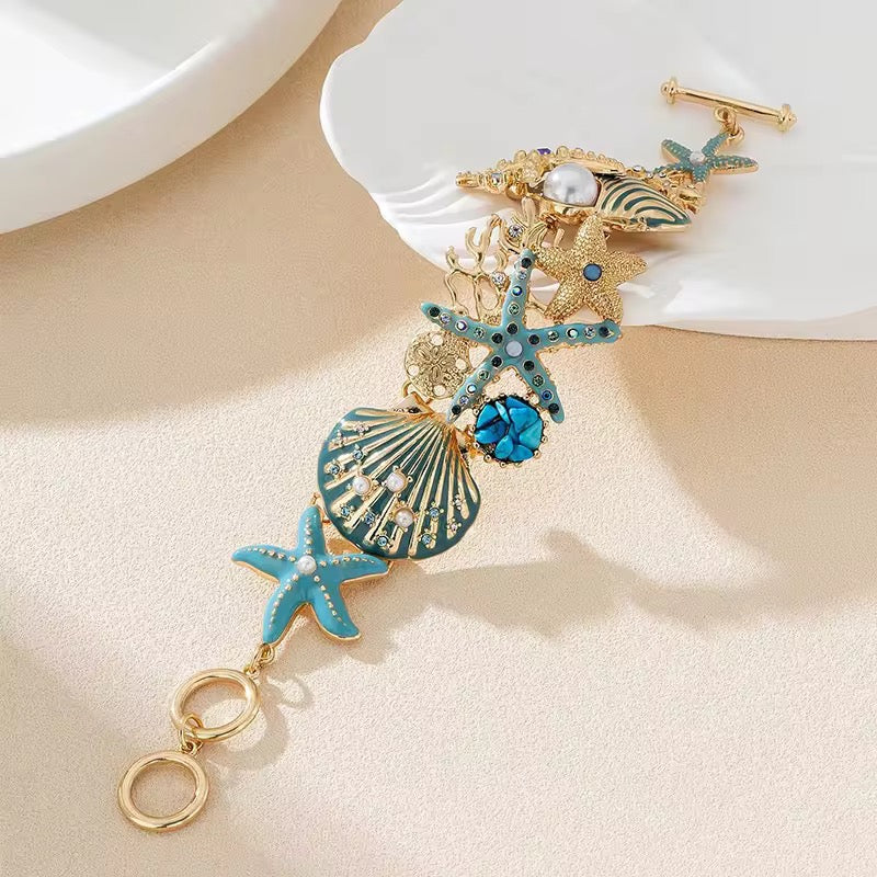 Ocean Bloom Bracelet – Sculpted Marine Charms in Gold & Turquoise