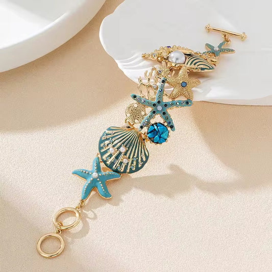 Ocean Bloom Bracelet – Sculpted Marine Charms in Gold & Turquoise